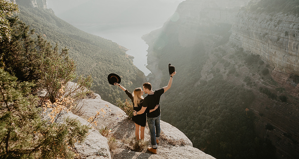Vlad and Nastya standing on the top of rock